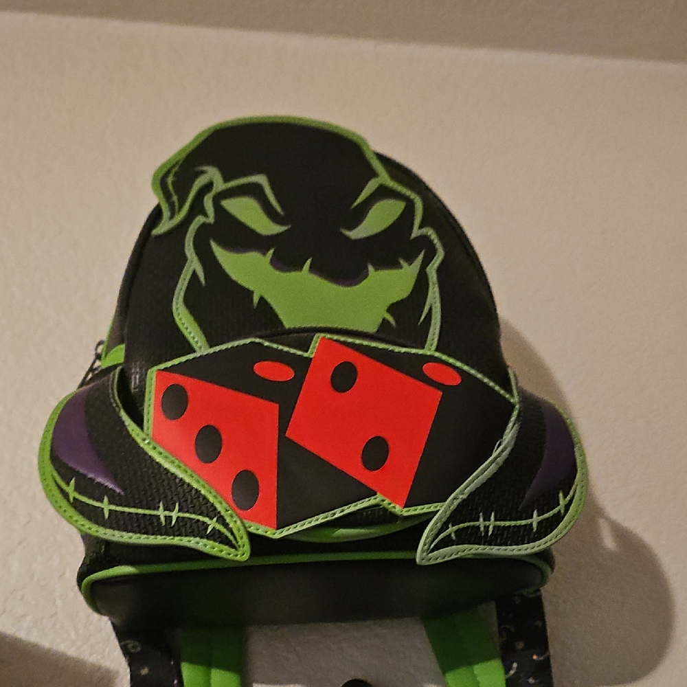 Loungefly Black and Green Backpack with Red Dice Design
